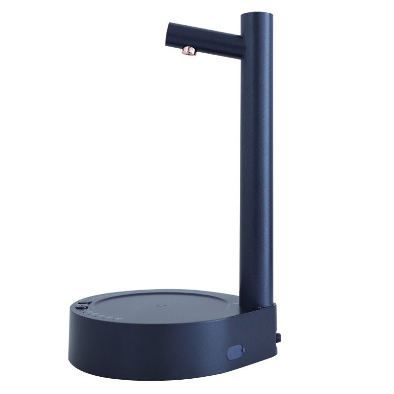 Rechargeable desktop water dispenser pump on desk with water bottle for convenient hydration