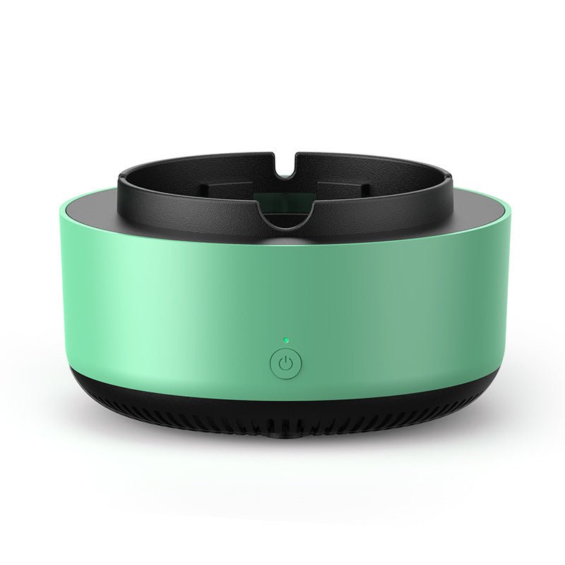 Smart smokeless ashtray with built-in air purifier on a table filtering smoke and odors